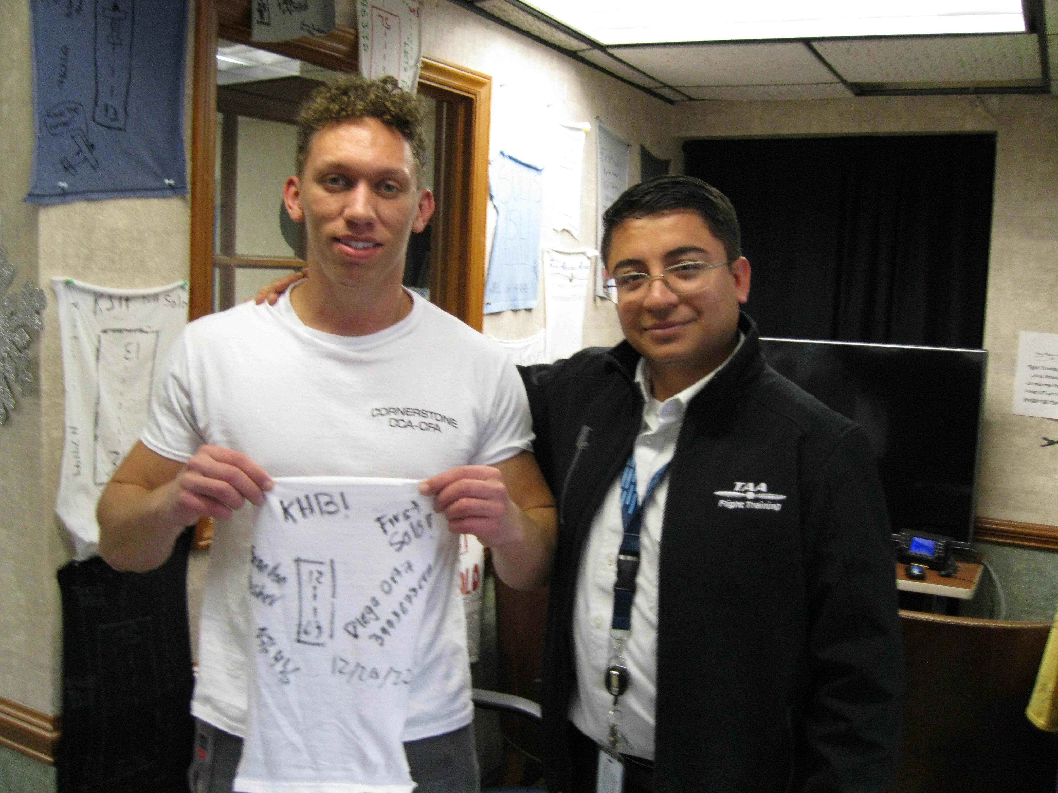 CFI and student celebrating milestone at Triad Aviation Academy