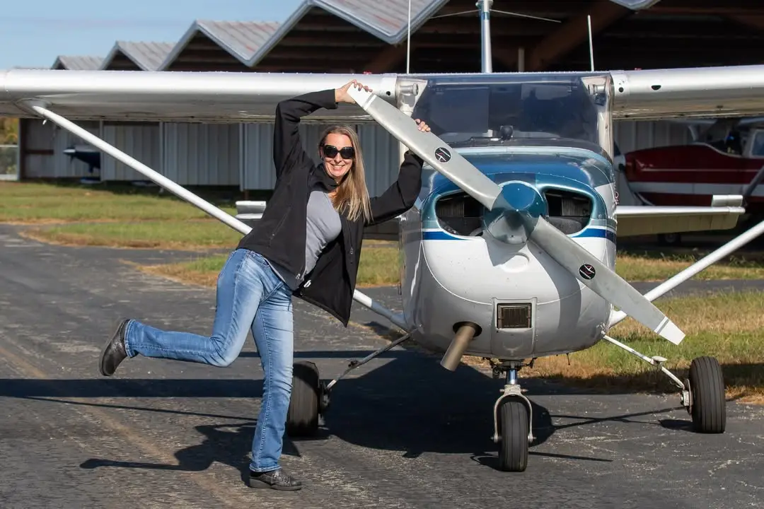 Flight instructor with aircraft at Triad Aviation Academy